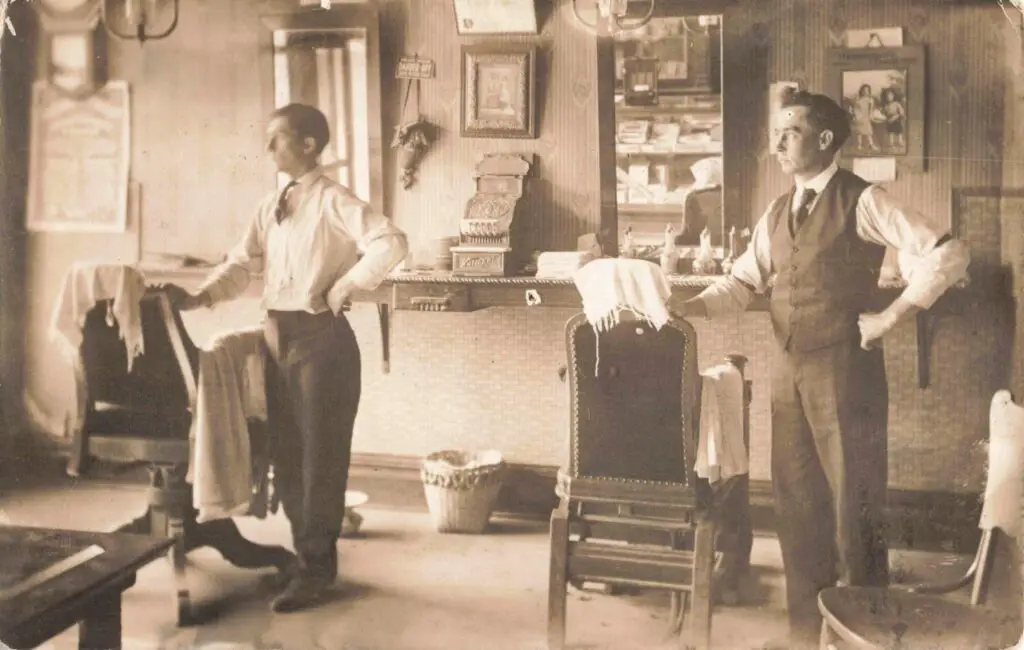 Two men in vintage barber shop.